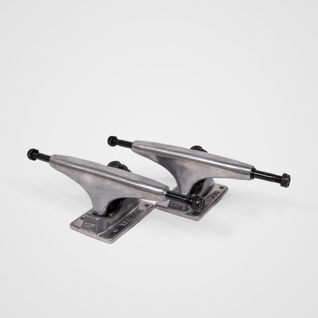 A Pair Of Raw Metal 5.25 Tensor Alloys Skateboard Trucks