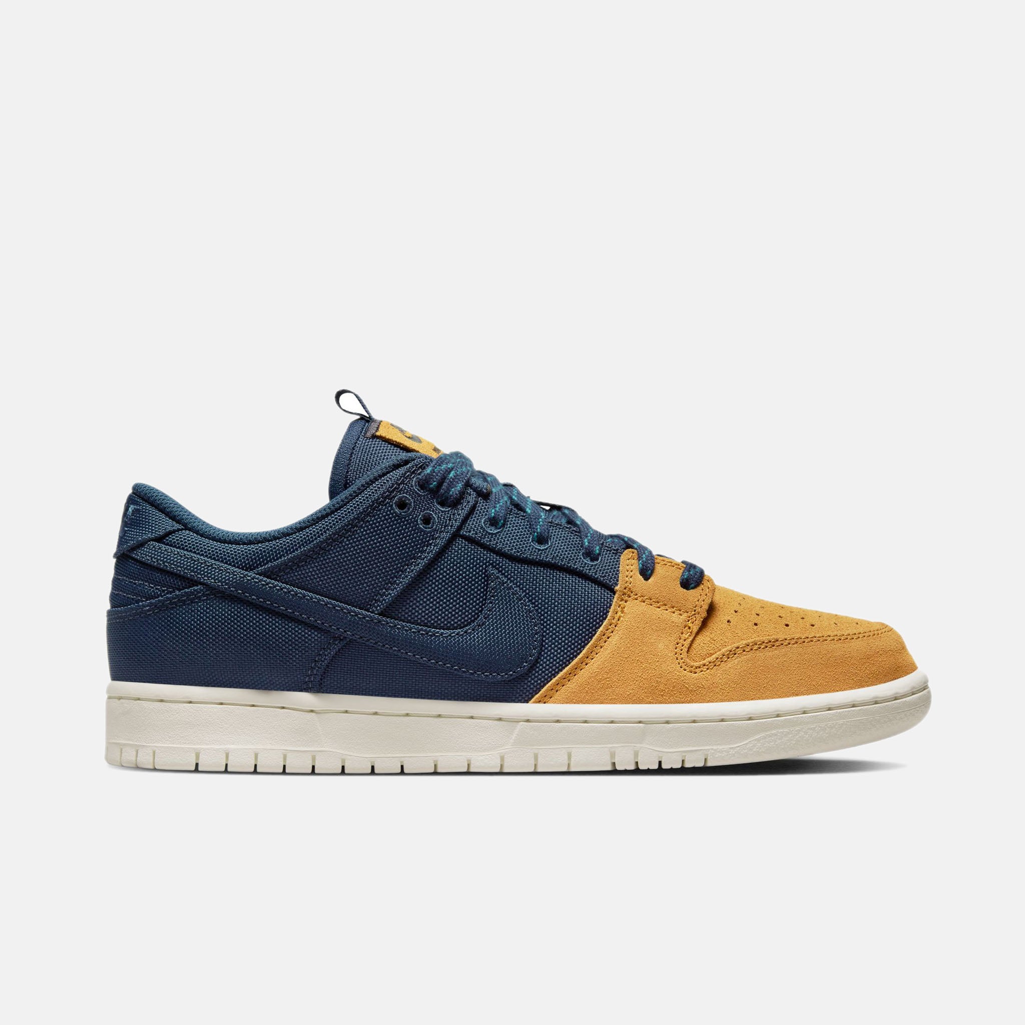 yellow and navy blue dunks