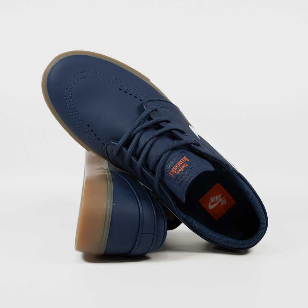 orange label light blue janoski