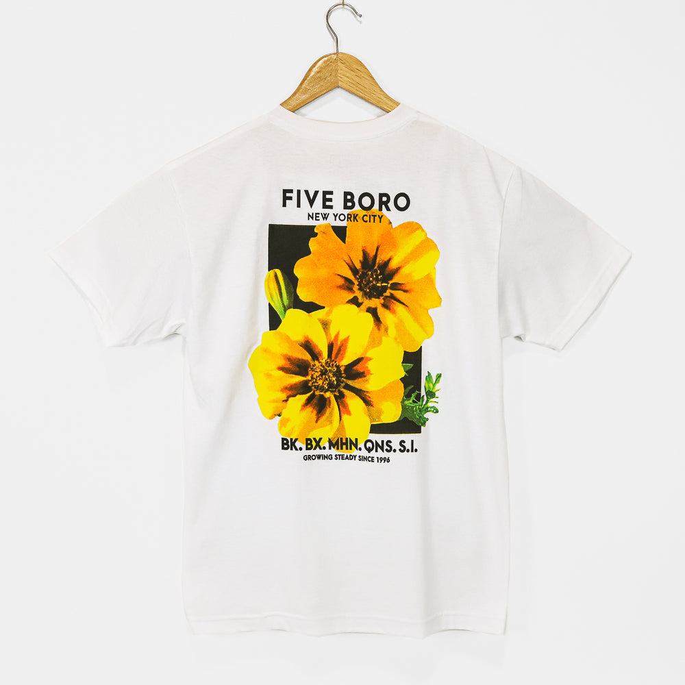 white shirt with yellow flowers