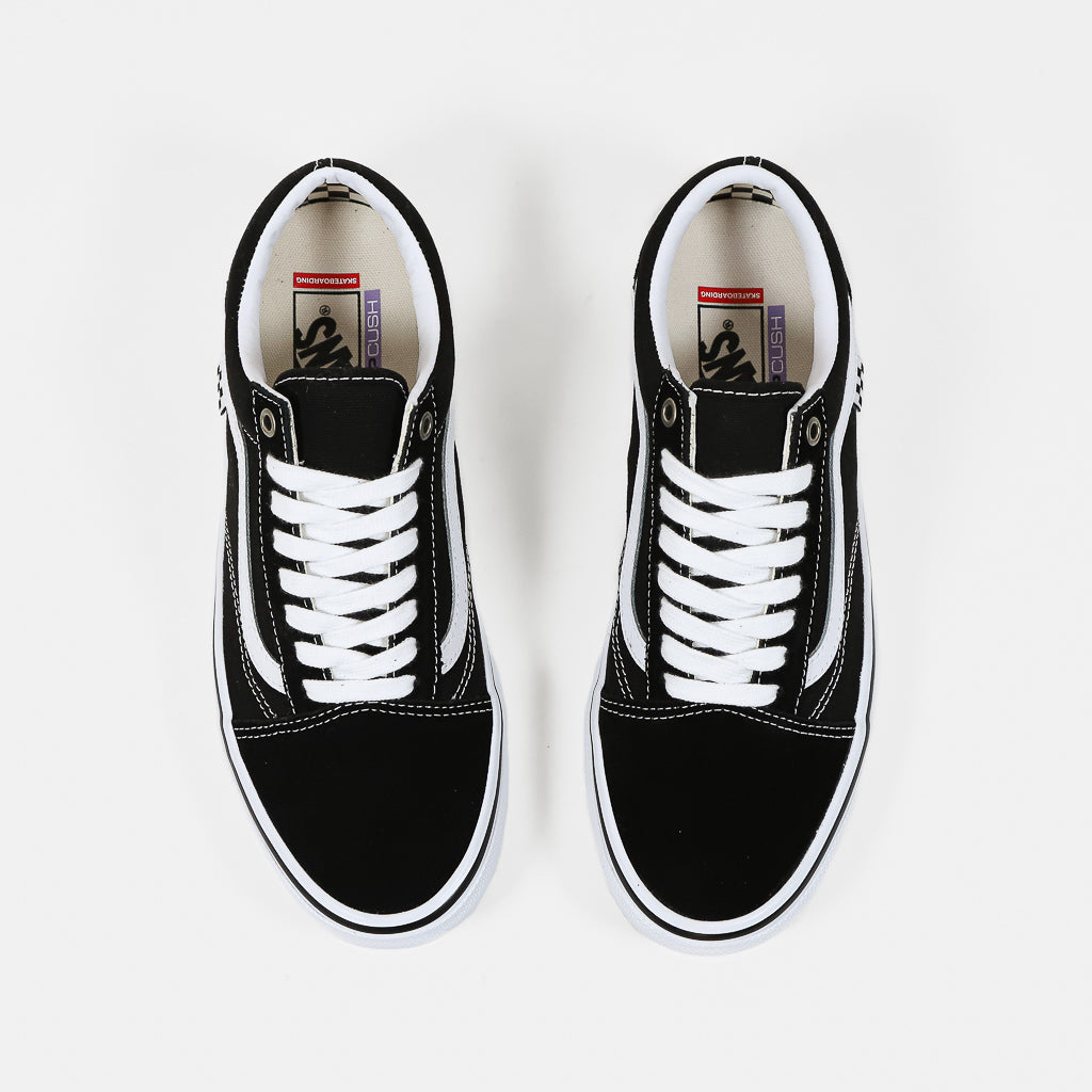 Black and white vans skate shoes hotsell